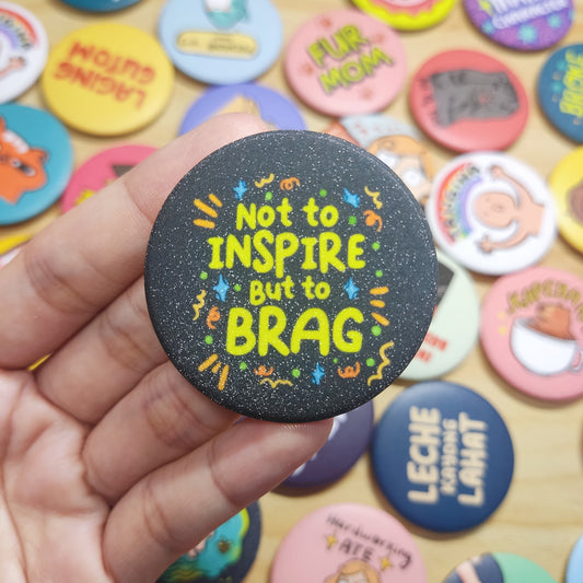 "Not to Inspire but to Brag" Button Pin (Glitter) | 1.75 Inches